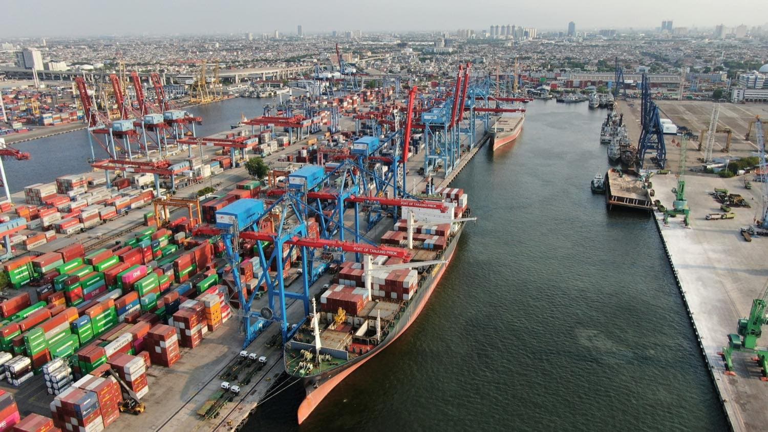 Aerial view of a container terminal with ships loading at berth